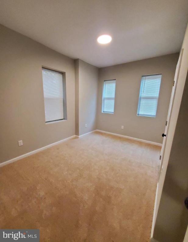 view of carpeted spare room