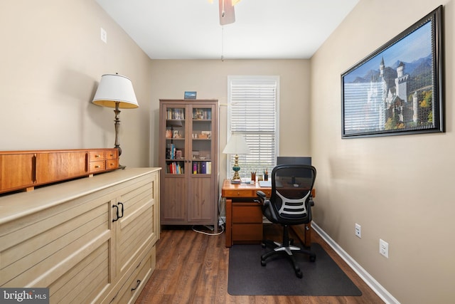 office space with dark wood-type flooring