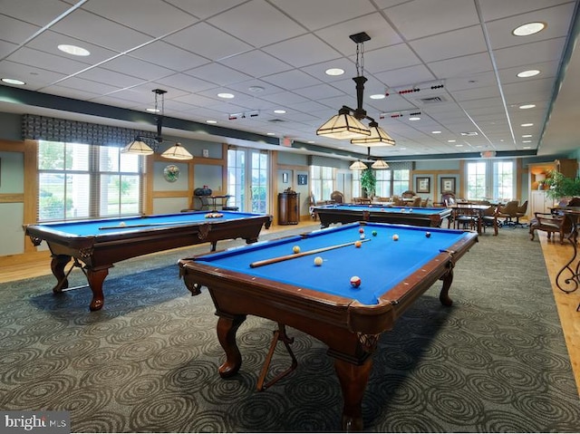 game room with pool table, carpet, and a drop ceiling