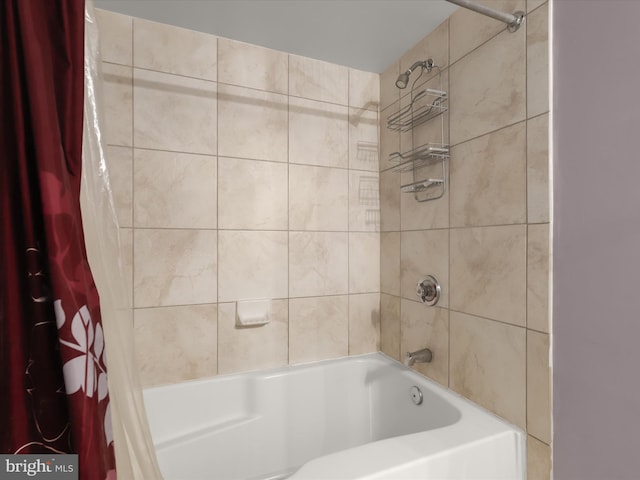 bathroom with shower / bathtub combination with curtain