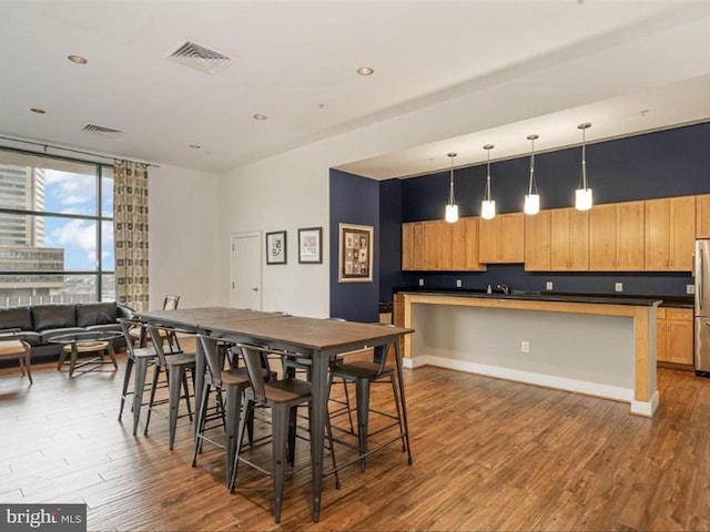 dining room featuring wood-type flooring