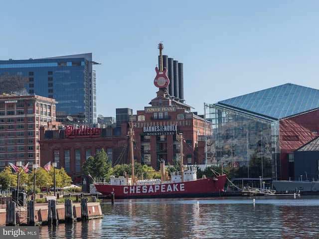 property's view of city featuring a water view