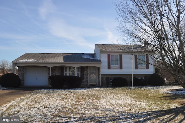 tri-level home featuring a garage