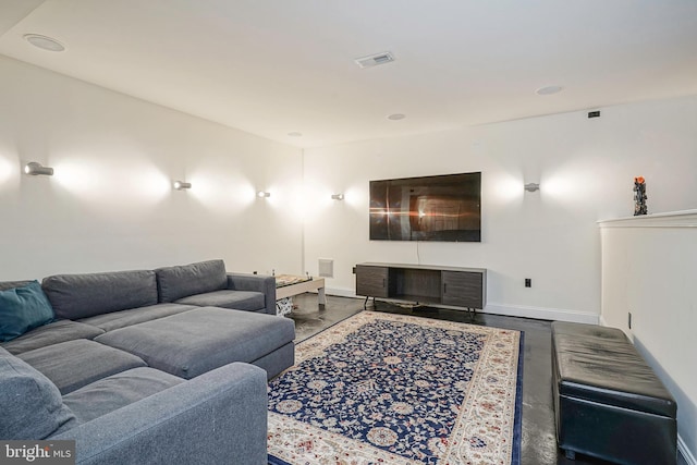 living room with concrete floors