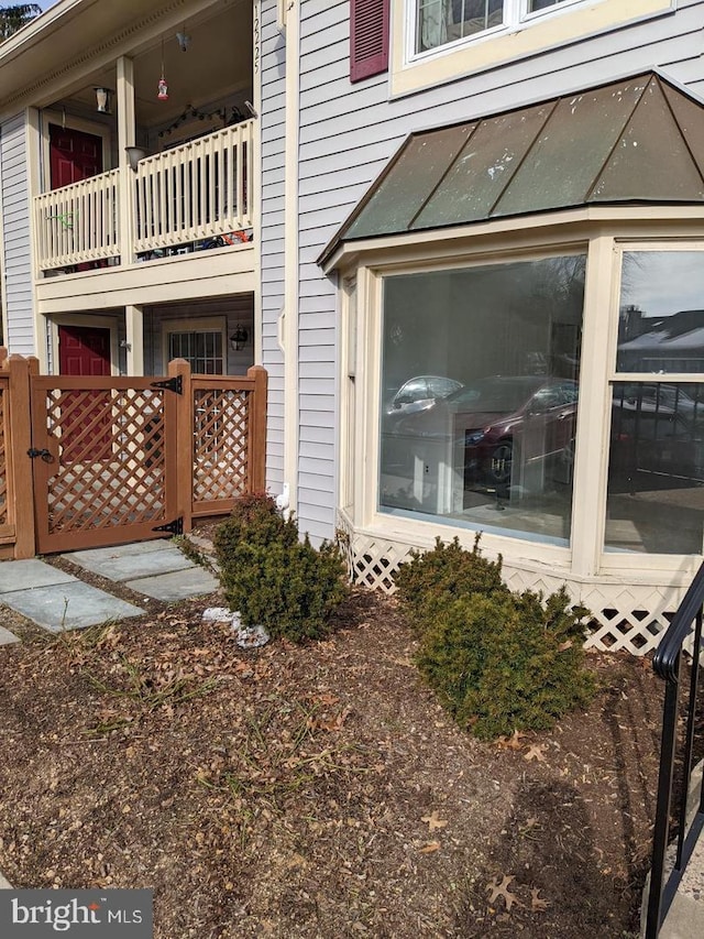 view of home's exterior featuring a balcony