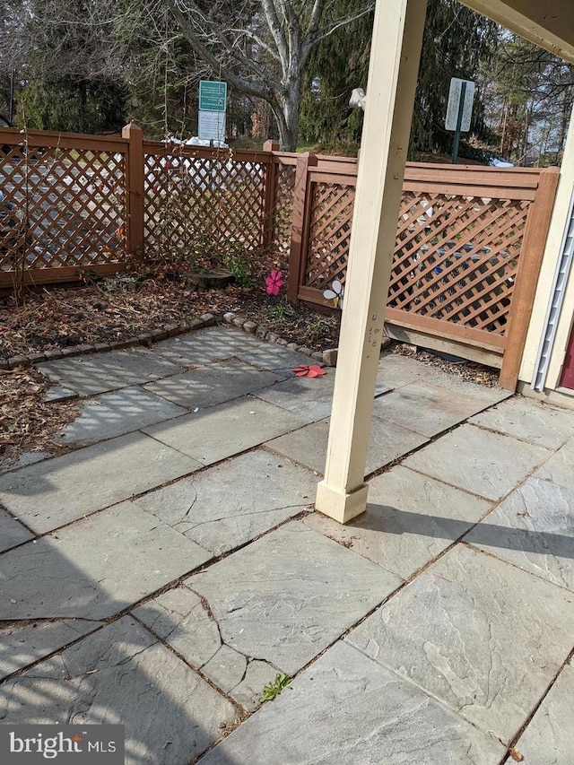 view of patio with fence