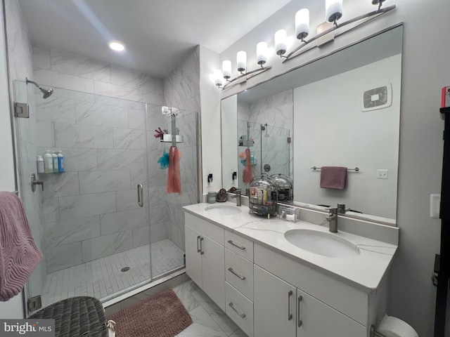 bathroom with vanity and walk in shower