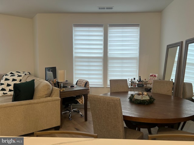 dining area featuring hardwood / wood-style flooring