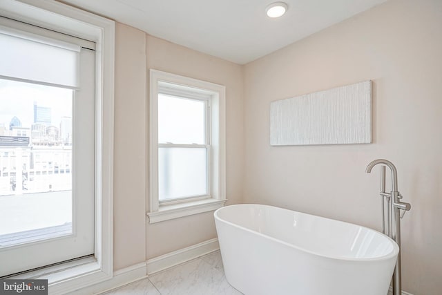 bathroom with a washtub