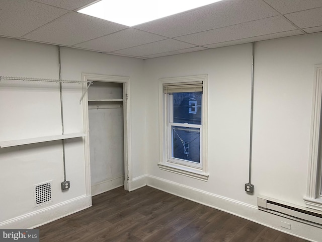 closet featuring baseboard heating