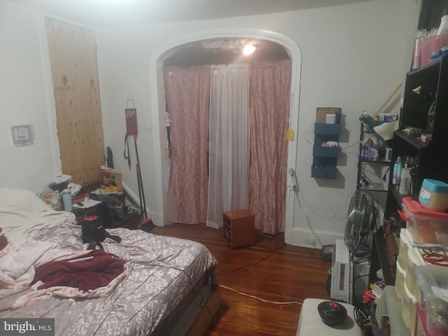 bedroom featuring dark hardwood / wood-style floors