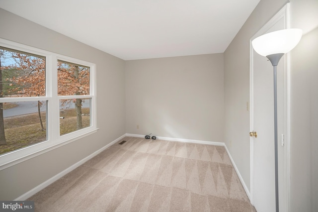 view of carpeted spare room