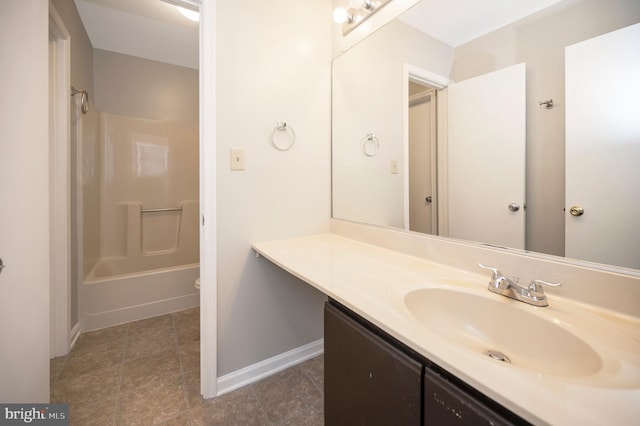 full bathroom with vanity, toilet, and washtub / shower combination