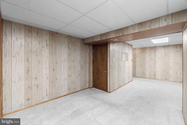 436 Heather Ridge Dr, Frederick, MD 21702 - finished basement with a paneled ceiling, baseboards, wooden walls, and carpet floors