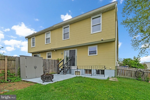 436 Heather Ridge Dr, Frederick, MD 21702 - rear view of property with a fire pit, a patio area, a lawn, and a fenced backyard