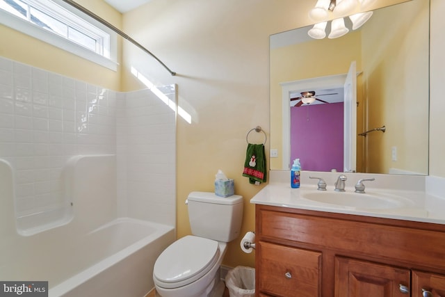 full bathroom with ceiling fan, toilet, shower / washtub combination, and vanity