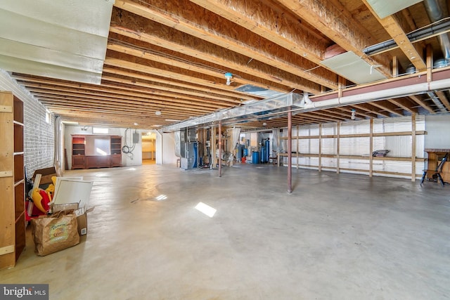 basement with brick wall