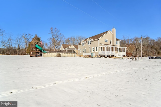 view of snow covered property