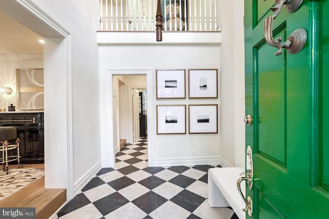 foyer with ornamental molding