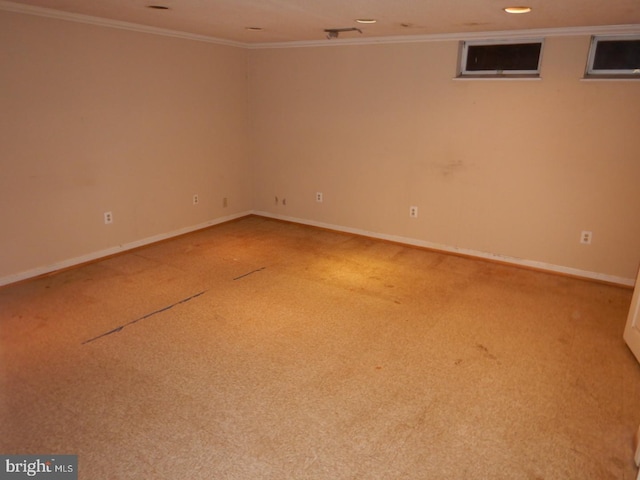 unfurnished room with carpet and ornamental molding