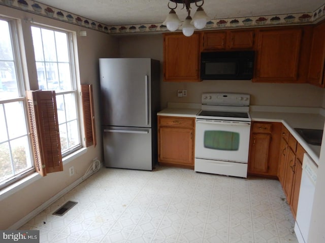 kitchen featuring white appliances