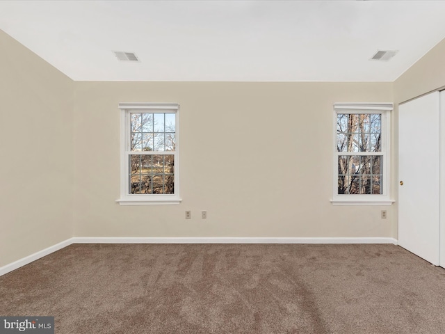 empty room with carpet floors