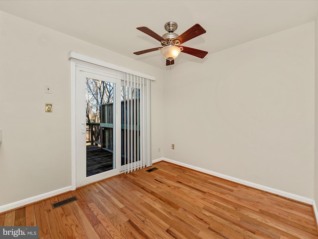 unfurnished room with light hardwood / wood-style floors and ceiling fan