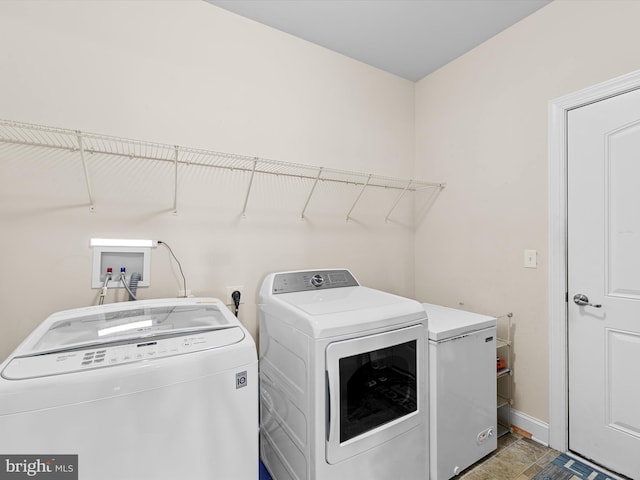 laundry area featuring washing machine and dryer