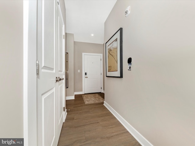 corridor with light wood-type flooring