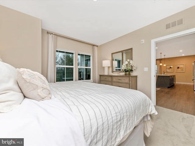 bedroom featuring hardwood / wood-style flooring