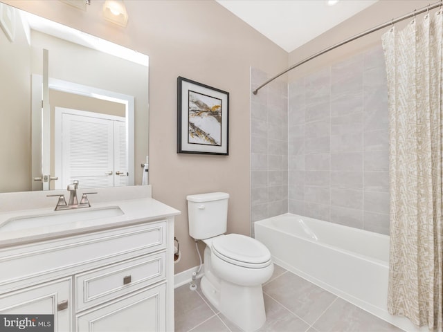 full bathroom with tile patterned flooring, vanity, toilet, and shower / tub combo