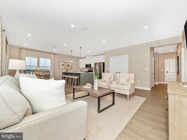 living room with light wood-type flooring