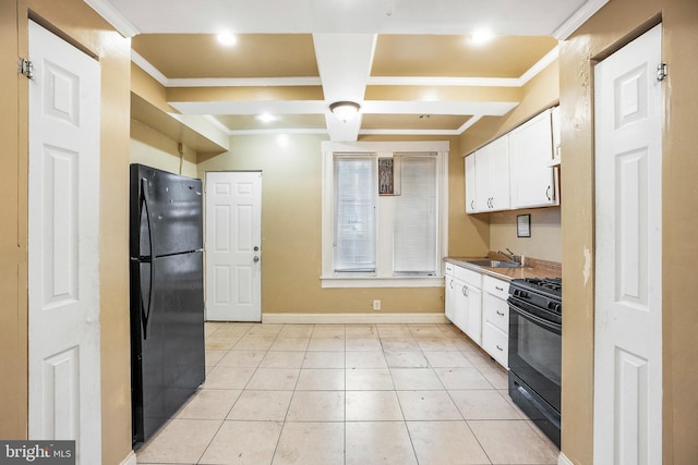 kitchen with white cabinetry, crown molding, and black appliances