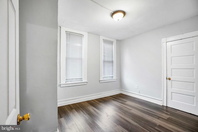 2348 Sidney Ave, Baltimore, MD 21230 - unfurnished room with dark wood finished floors and baseboards