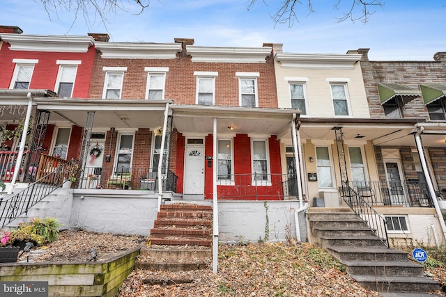 2348 Sidney Ave, Baltimore, MD 21230 - view of property featuring brick siding and covered porch