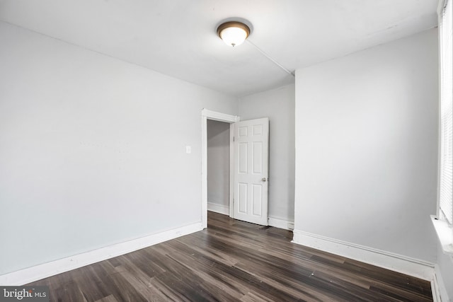 2348 Sidney Ave, Baltimore, MD 21230 - empty room with dark wood-type flooring and baseboards