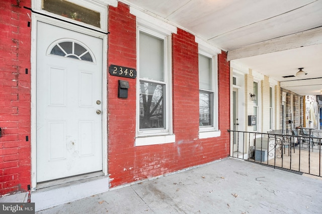 2348 Sidney Ave, Baltimore, MD 21230 - entrance to property with brick siding and covered porch