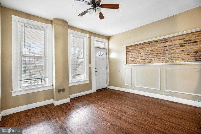 2348 Sidney Ave, Baltimore, MD 21230 - entryway with ceiling fan, wood finished floors, and wainscoting