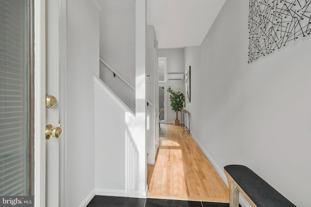 corridor with tile patterned flooring