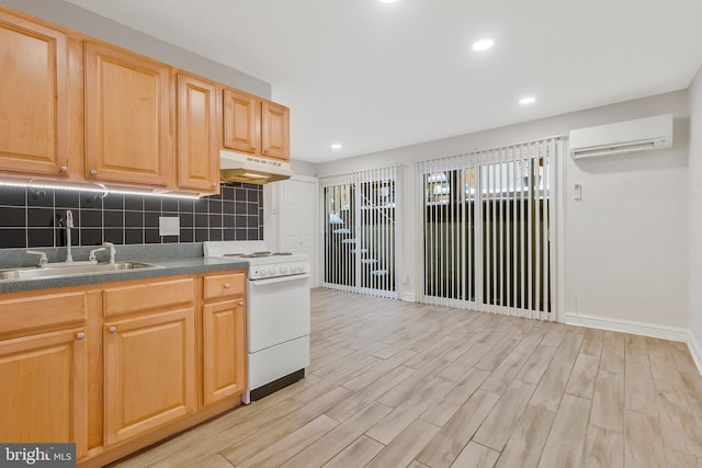 kitchen with a wall mounted AC, white range with electric stovetop, sink, light hardwood / wood-style flooring, and backsplash