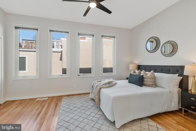 bedroom featuring ceiling fan and light hardwood / wood-style floors