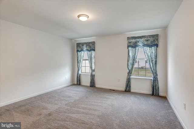 view of carpeted spare room