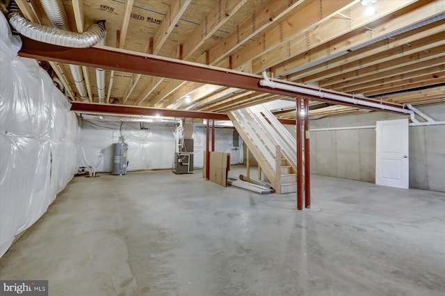 basement with heating unit and water heater