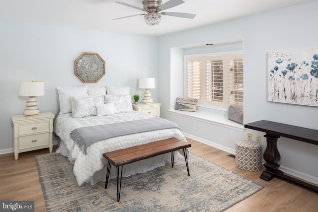 bedroom featuring ceiling fan and wood-type flooring