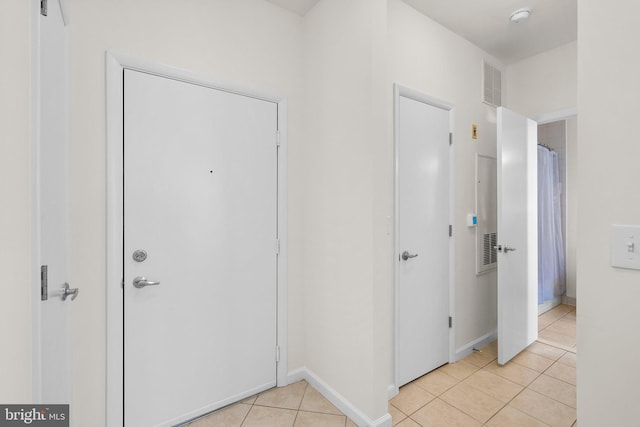 foyer with light tile patterned floors