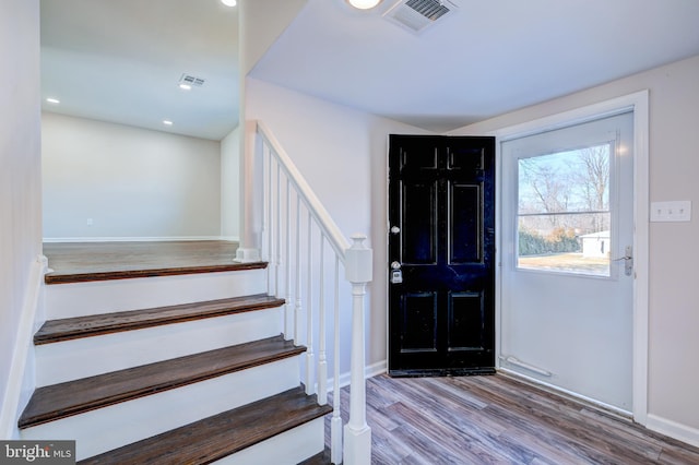 entrance foyer with hardwood / wood-style floors