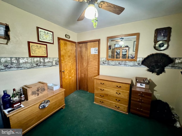 bedroom with ceiling fan, a closet, and dark colored carpet