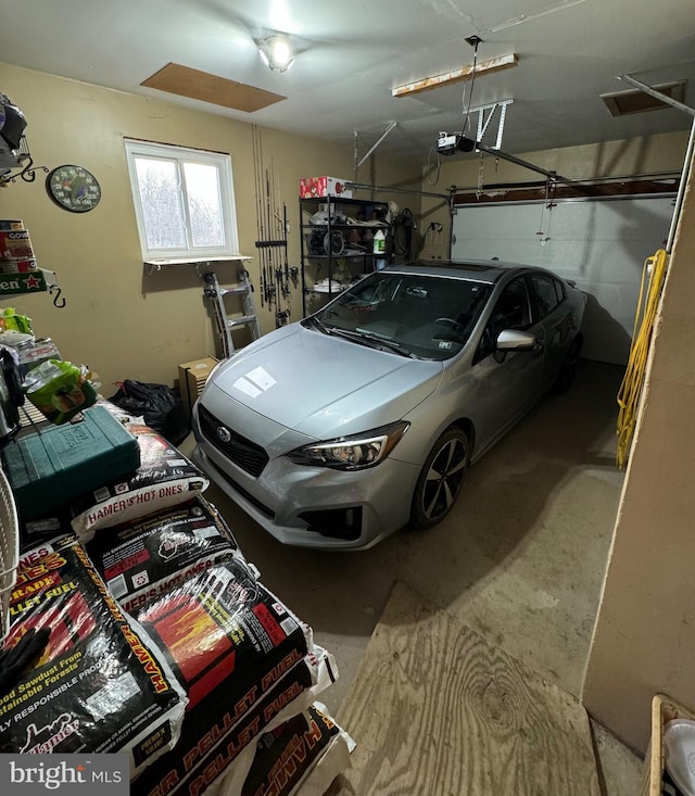 garage featuring a garage door opener