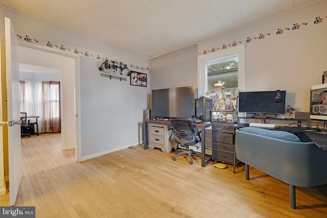 office space with light hardwood / wood-style flooring