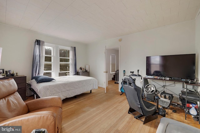 bedroom with light hardwood / wood-style flooring